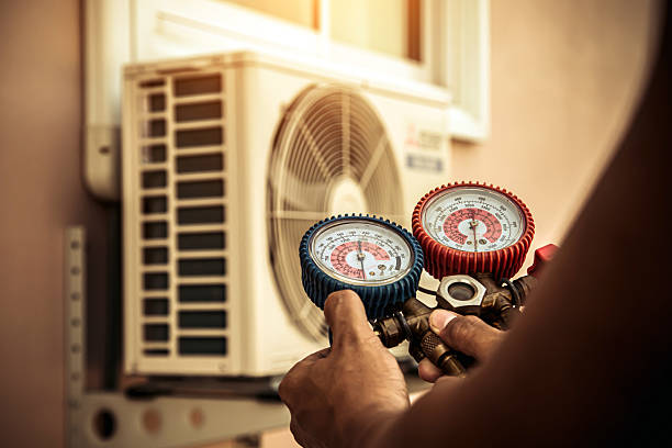 Professional Air Conditioning Service technician working in Newcastle, WA